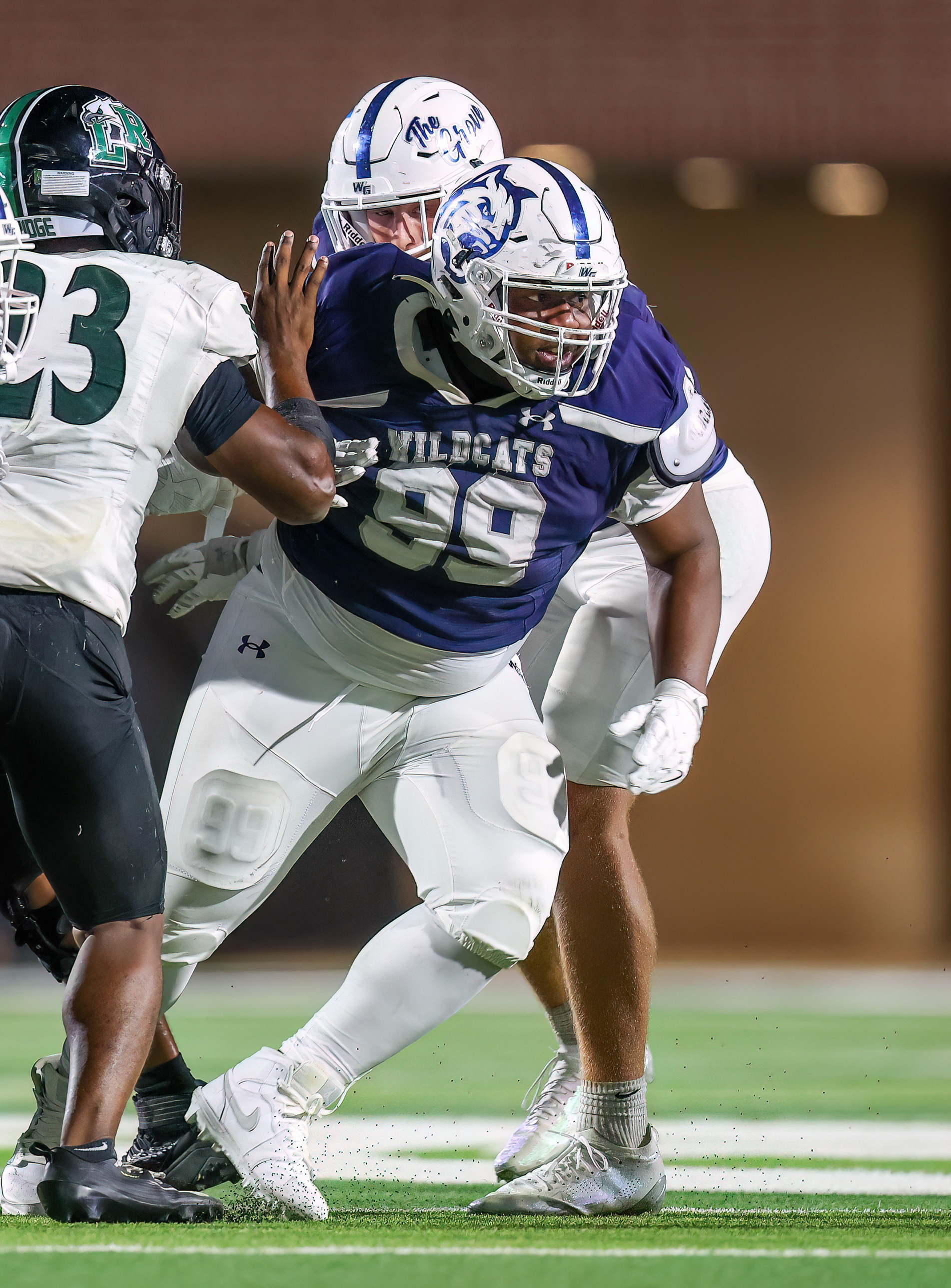 Kristopher Williams engaging a blocker against Lake Ridge
