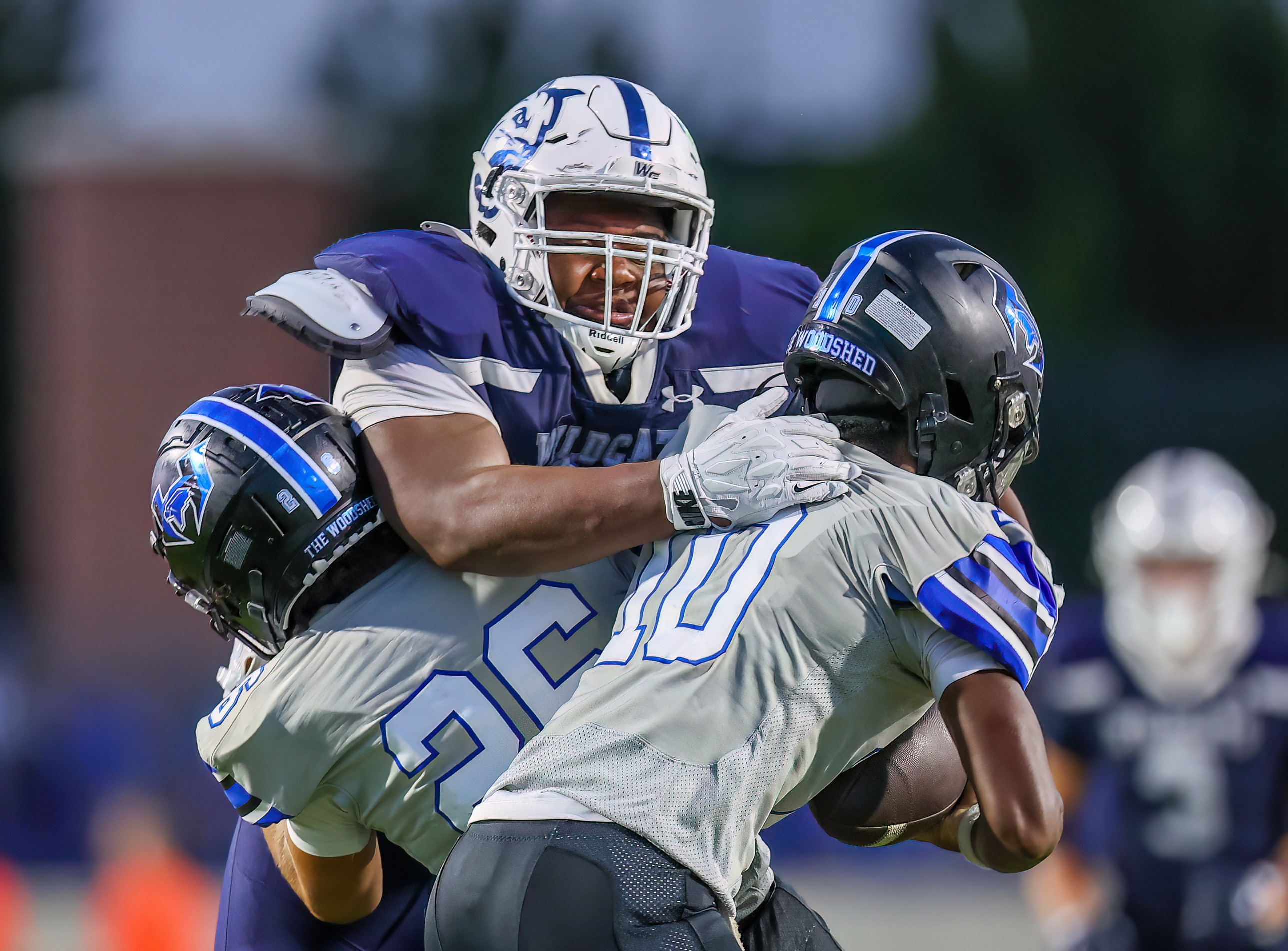Kristopher Williams tackling the ball carrier against Hebron